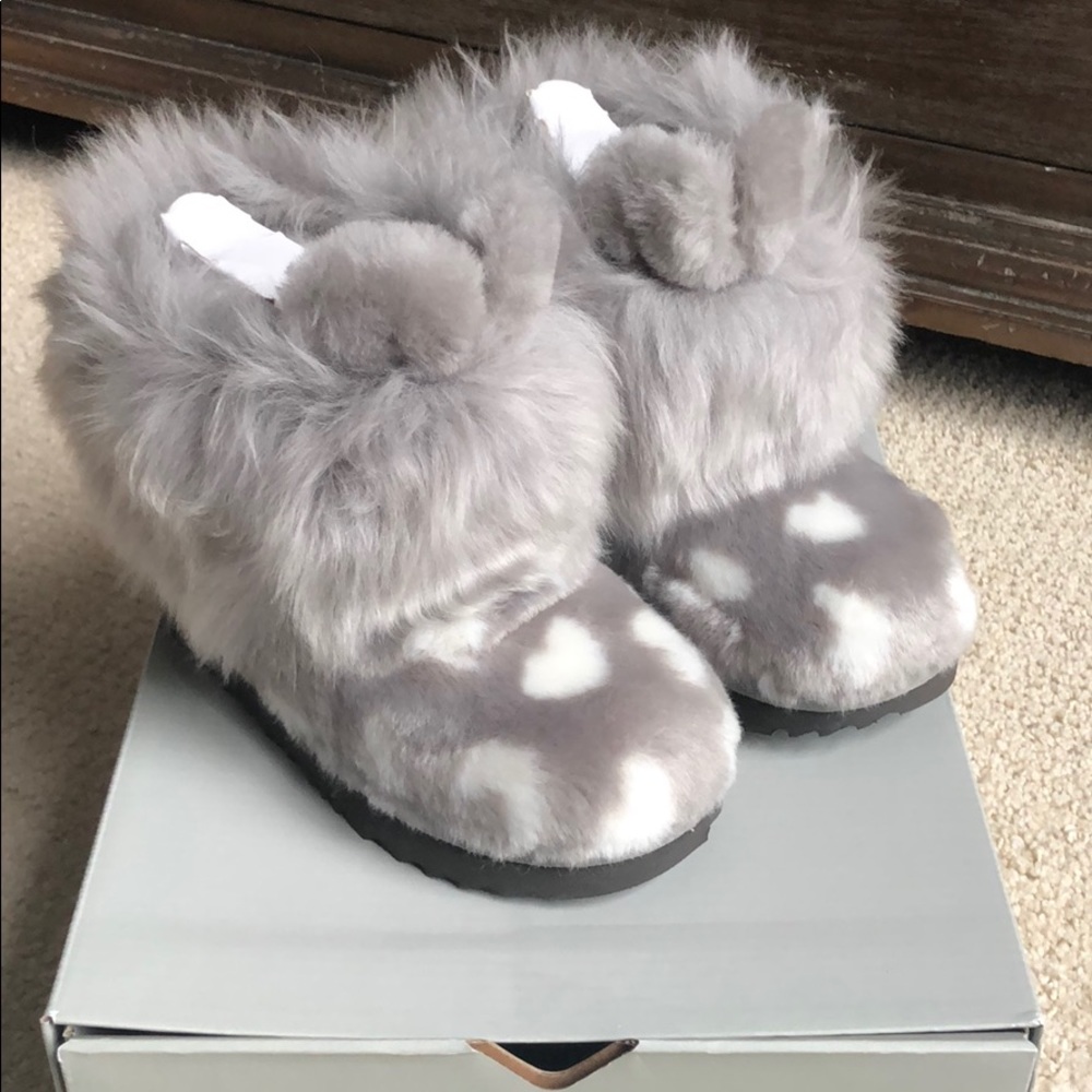 Girls Ugg classic mini bootie in a rabbit style.